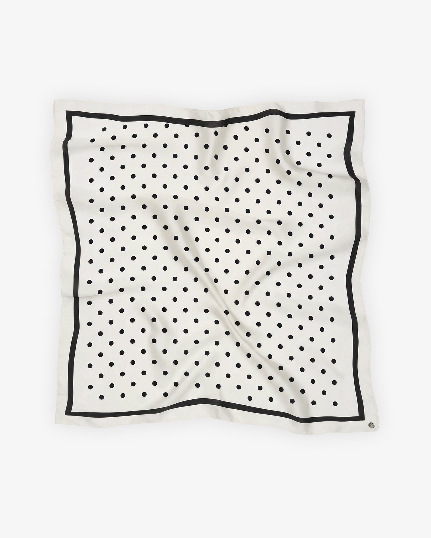 Foulard à pois blanc et noir