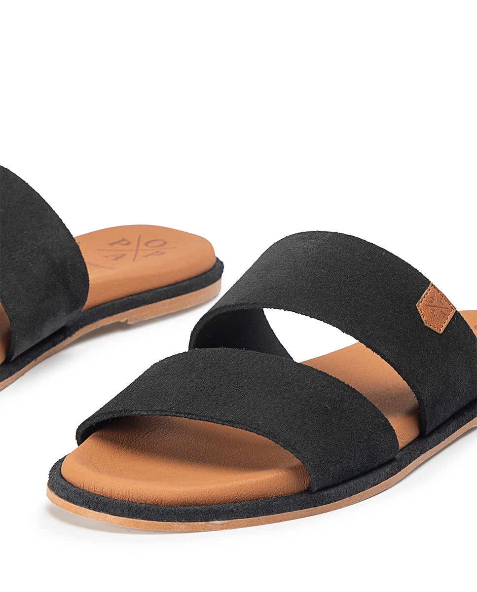 Sandale plate portable en daim noir